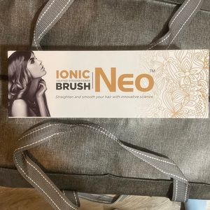 New in box - Neo heated straightening brush